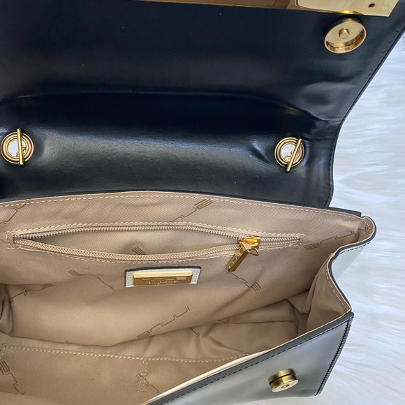 Elegant Black and White Shoulder Bag with Gold Accents - Picture 4 of 5